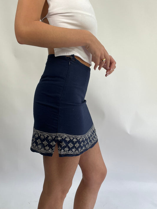 COASTAL COWGIRL DROP | small navy linen skirt with white floral embroidery