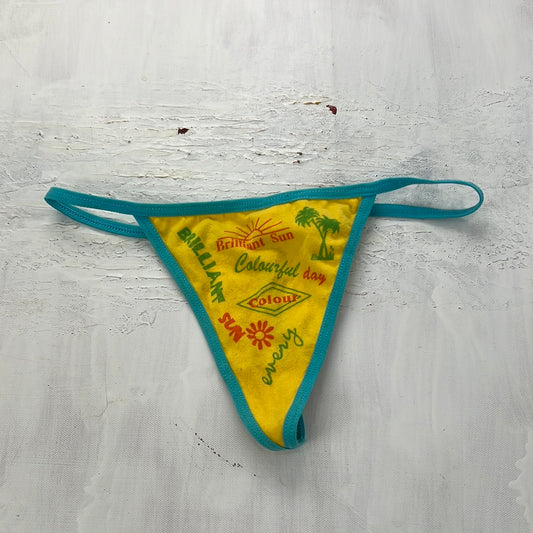 COACHELLA DROP | yellow and blue thong with brilliant spell out and sun pattern