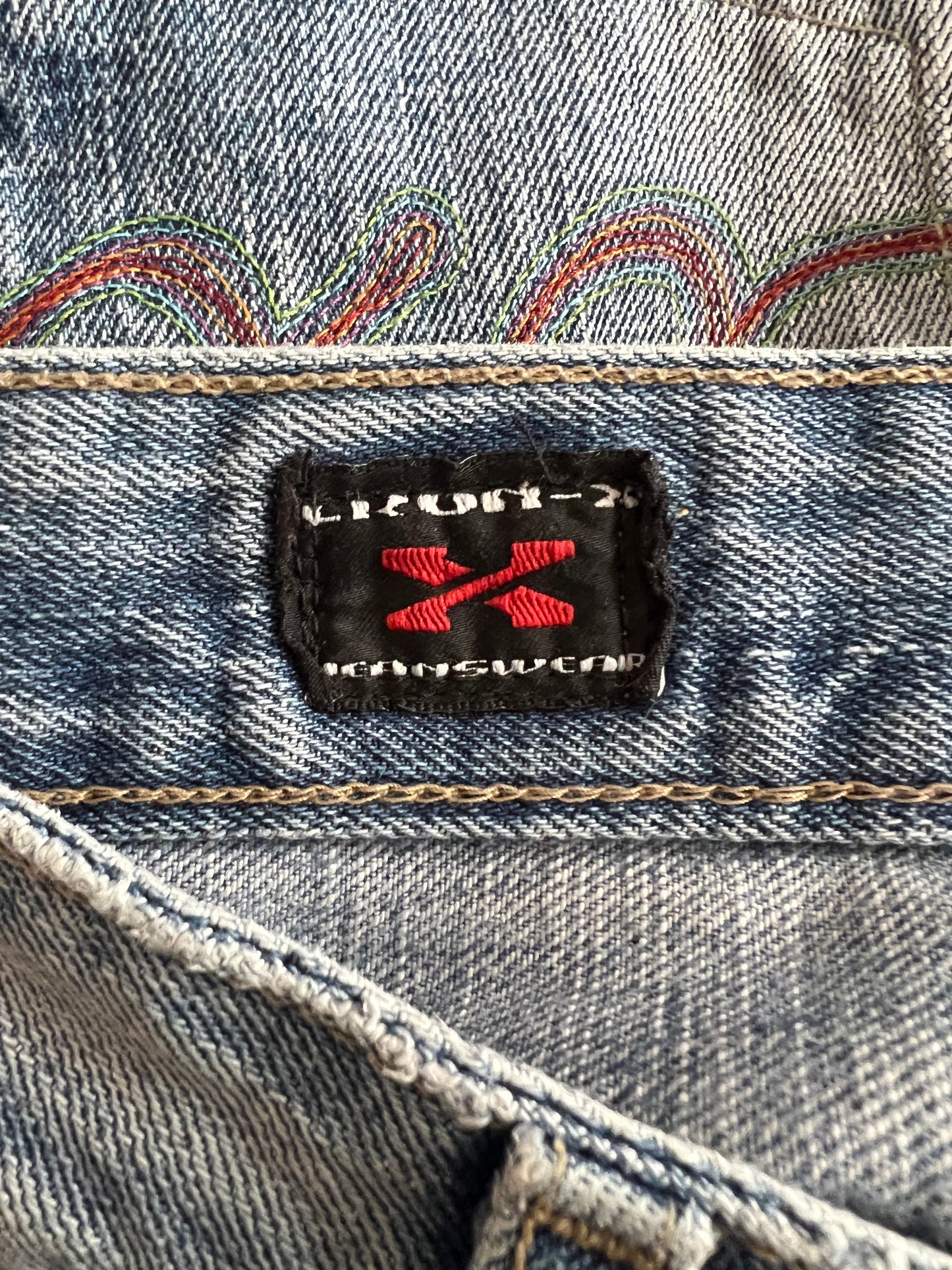 gilmore girls | small light blue denim mini skirt with colourful stitching