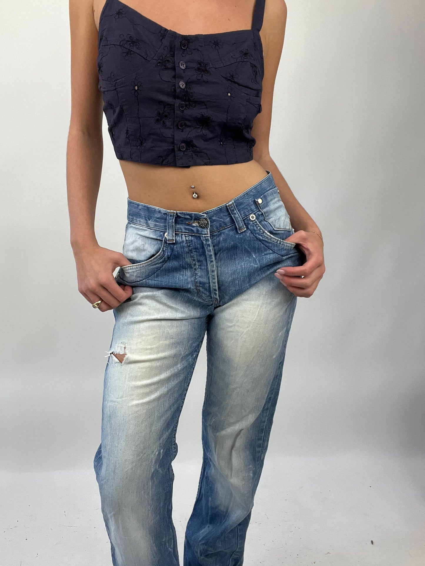 COASTAL COWGIRL DROP | medium light wash denim jeans with distressed detail