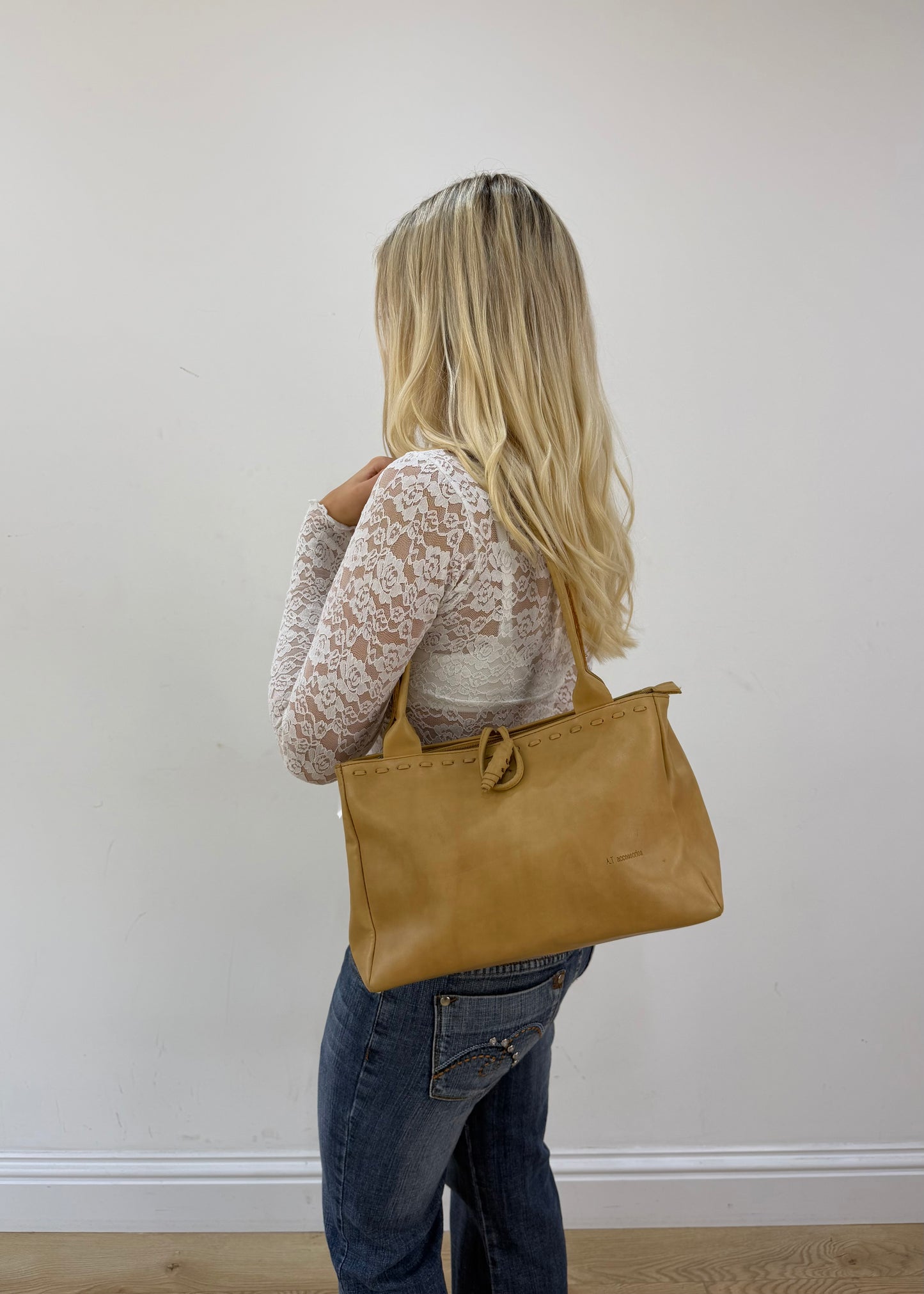mustard yellow shoulder bag detail view