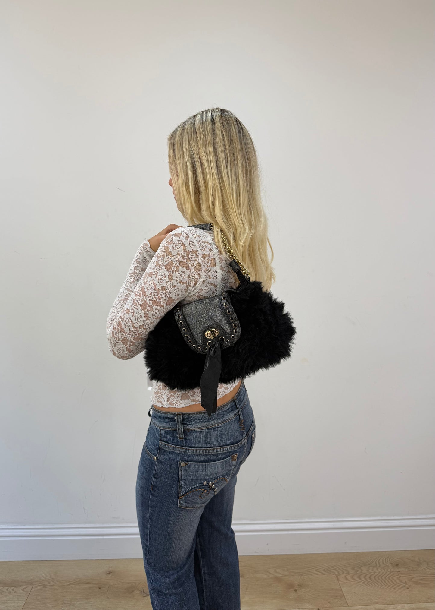 small black fur shoulder bag with gold chain and ribbon bow 5