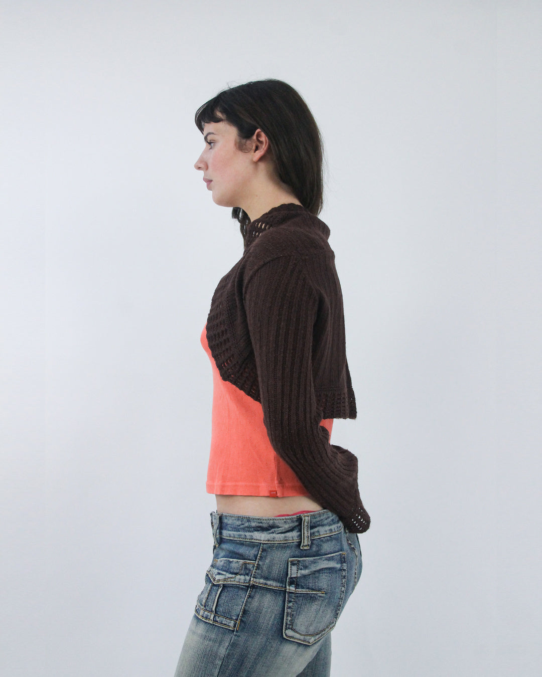 small brown ribbed cropped shrug, opposite side view