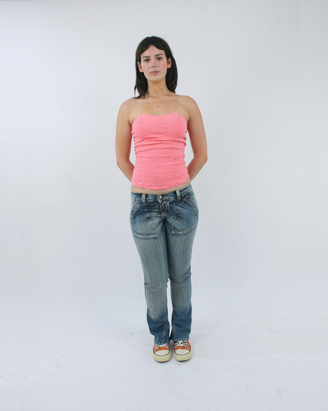 pink textured strapless top, front view