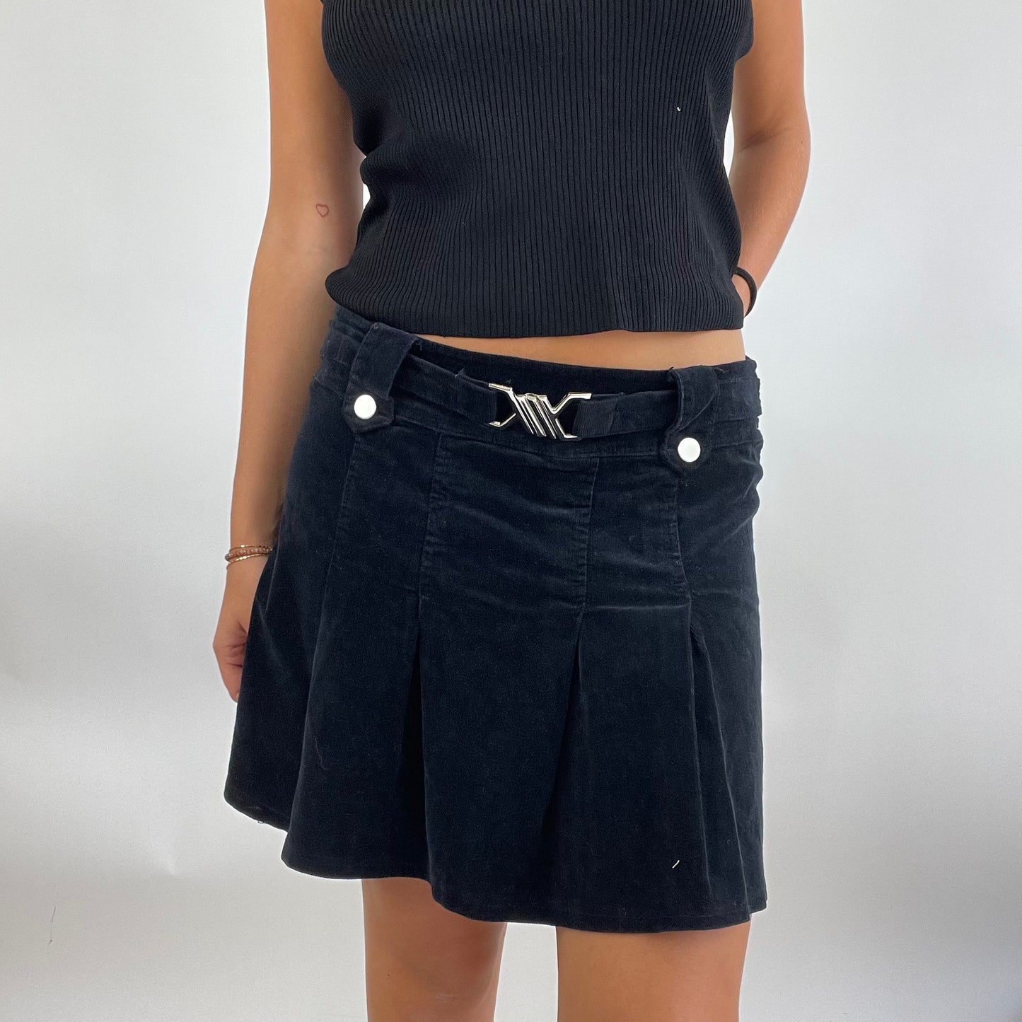 MODEL OFF DUTY DROP | small black corduroy skirt with buckle