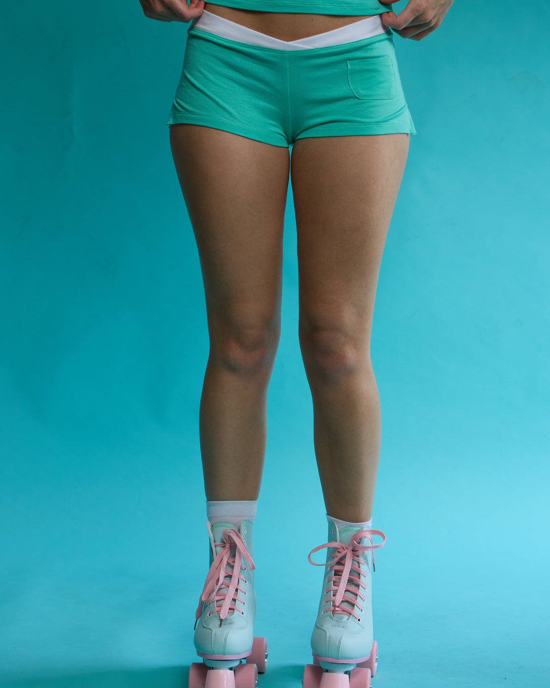 The Lorelle Shorts in Aqua – roller-skate campaign detail