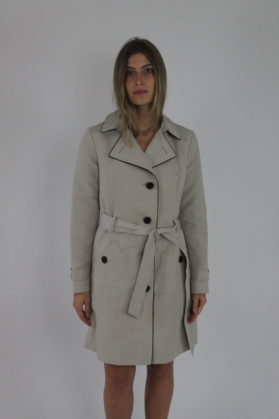 beige belted trench coat front view
