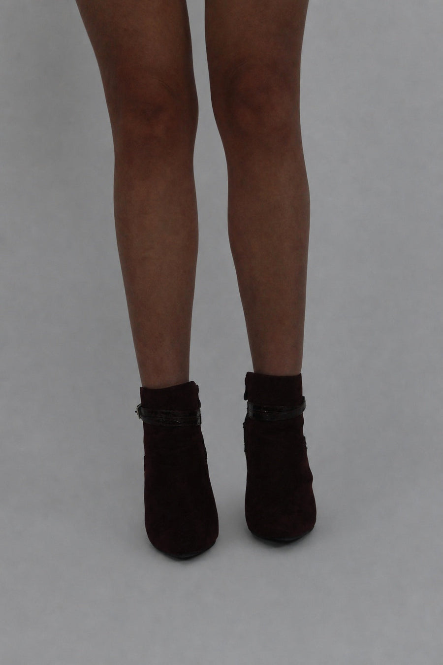 black buckle ankle boots front view