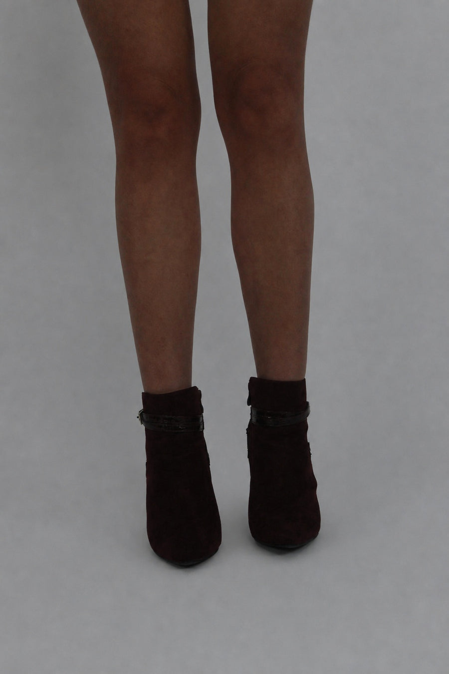 black buckle ankle boots front view