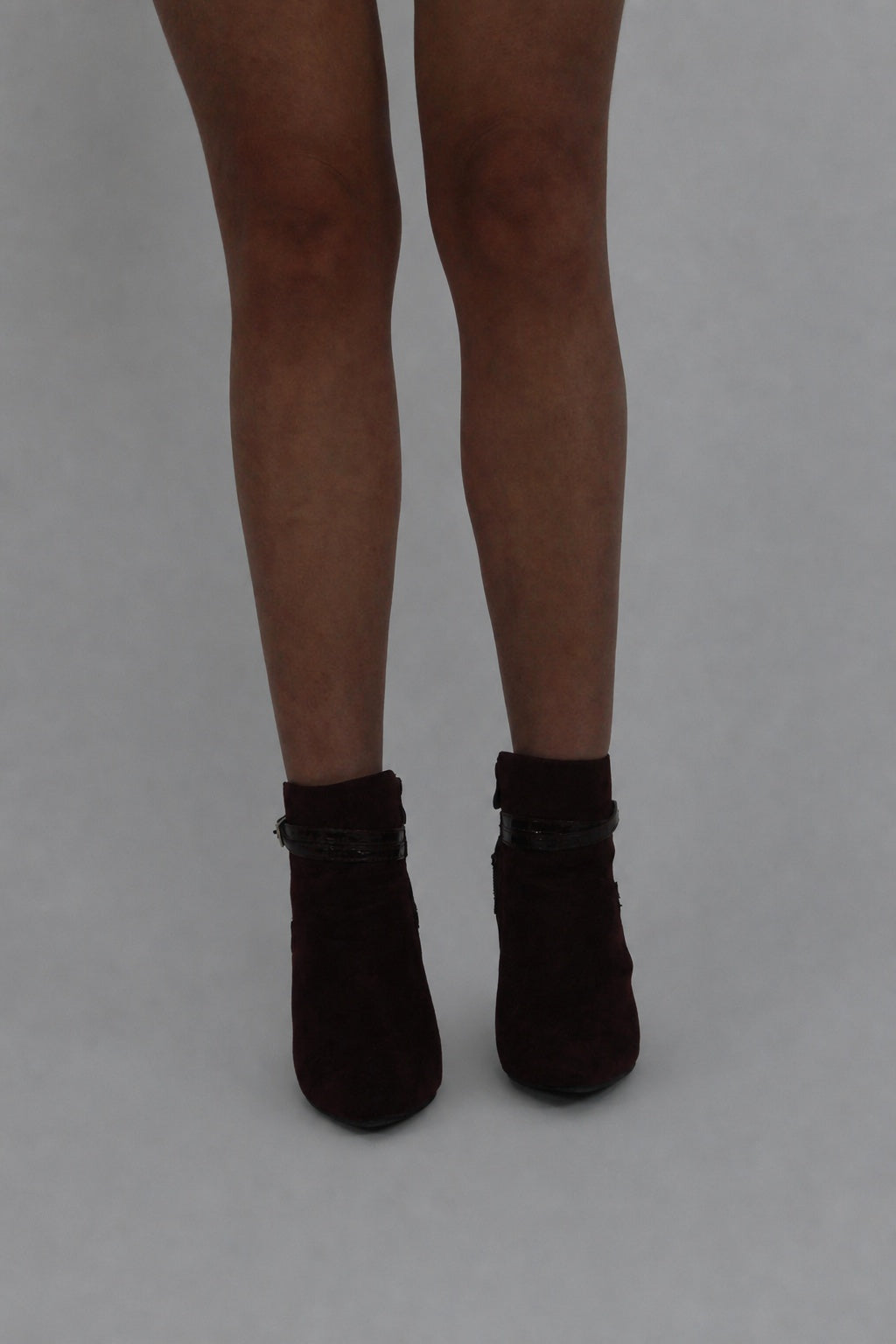 black buckle ankle boots front view