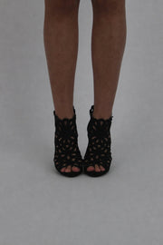 black caged peep-toe ankle boots front view