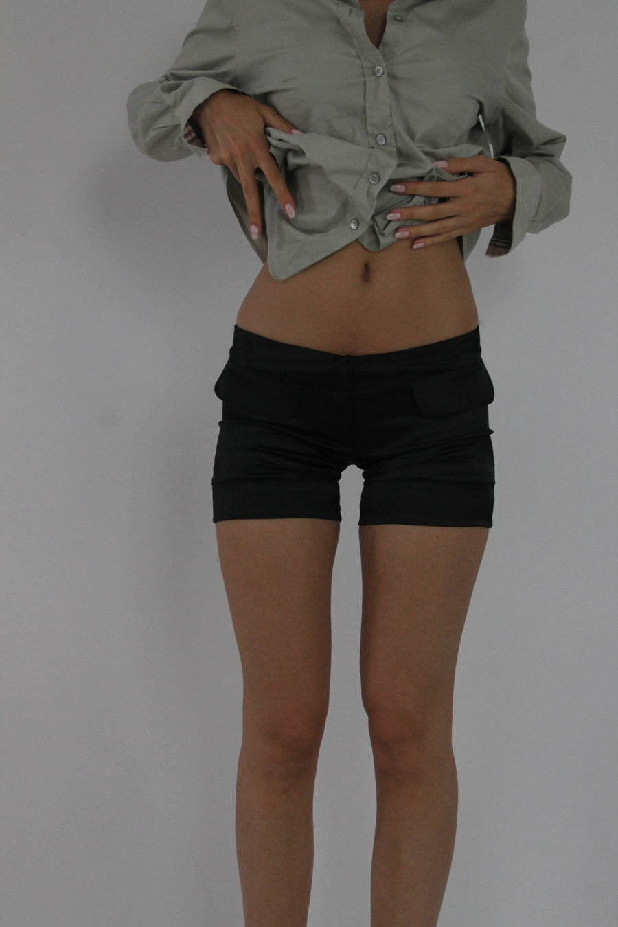 black fitted mini shorts front view