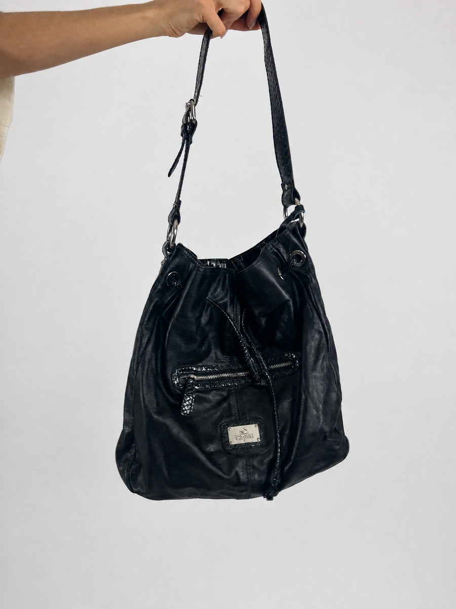 black hobo handbag with hanging details front view