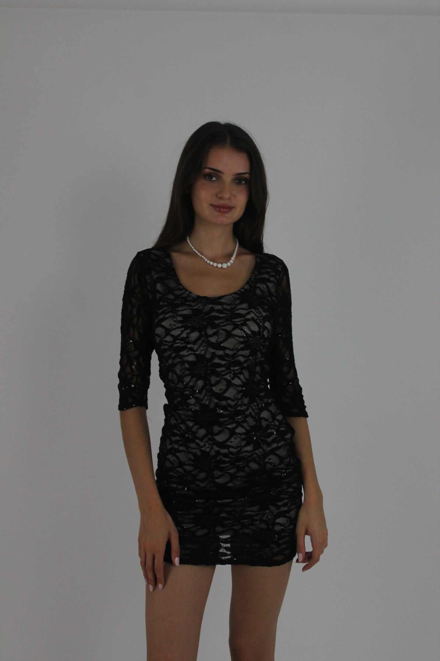 black lace three-quarter-sleeve mini dress front view