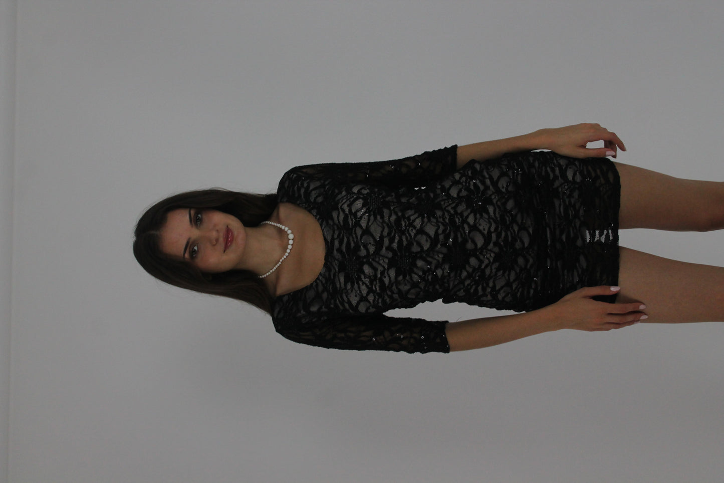 black lace three-quarter-sleeve mini dress front view