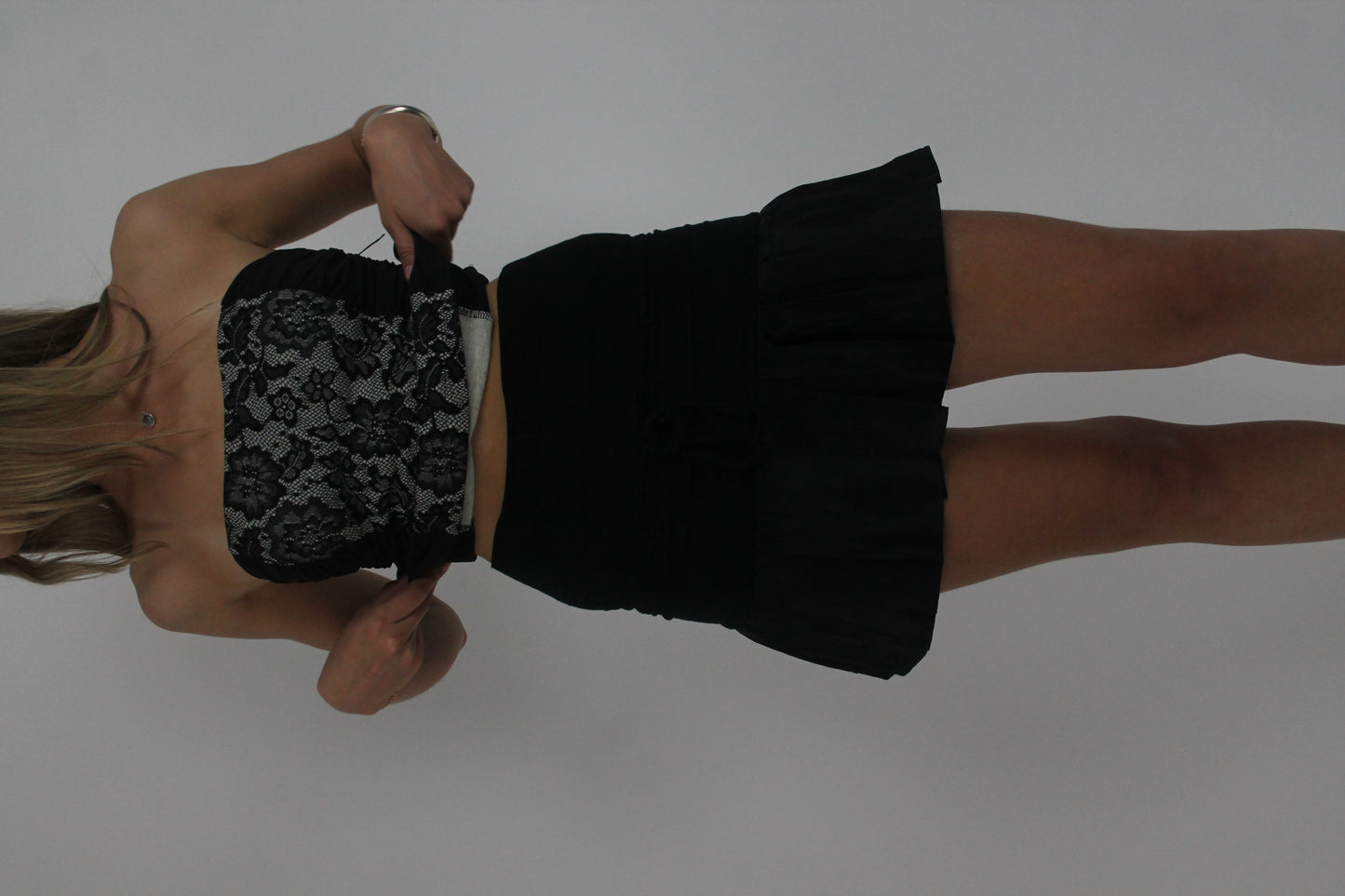black ruffle mini skirt front view