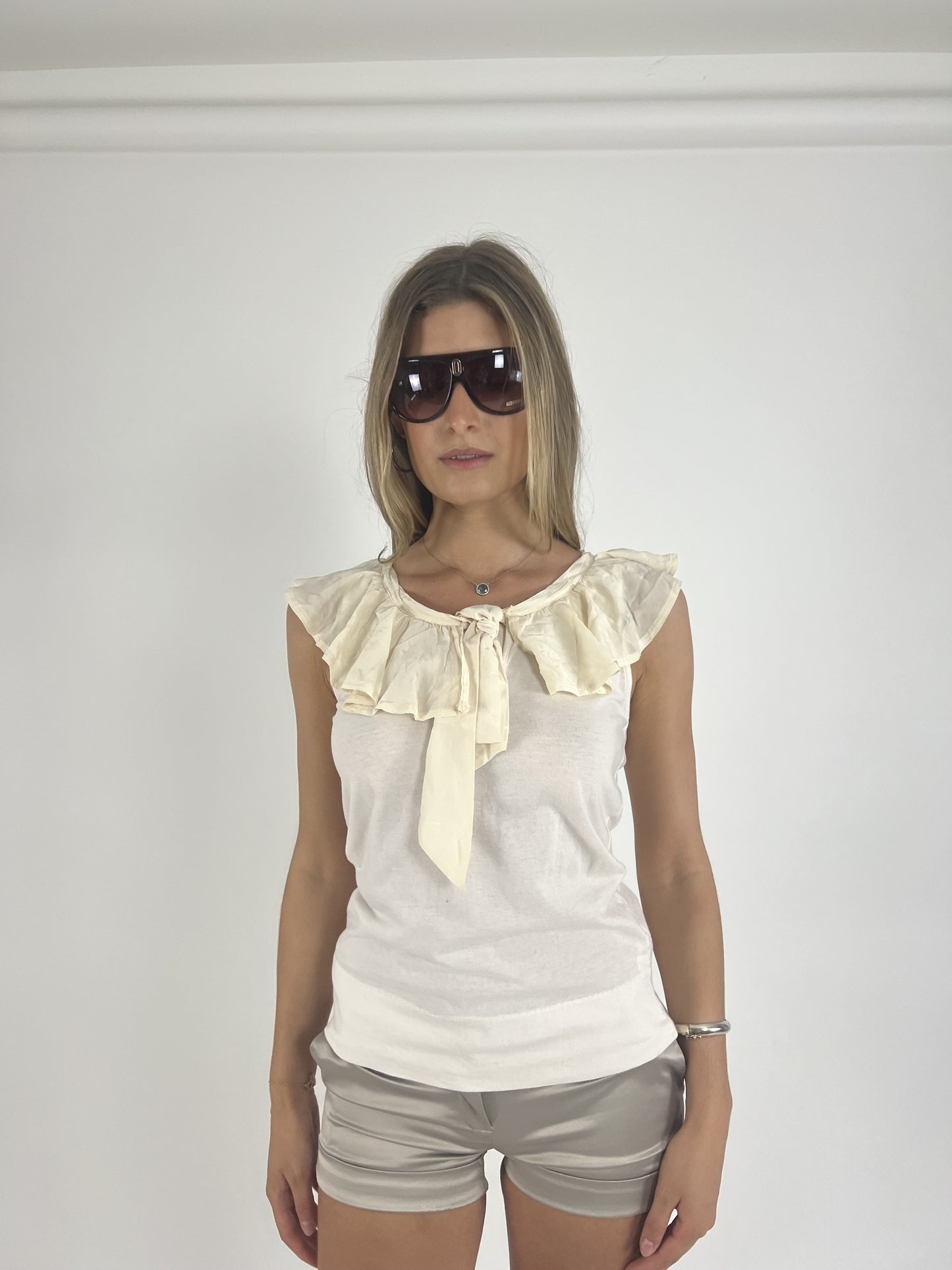 cream ruffle-neckline cap-sleeve top front view