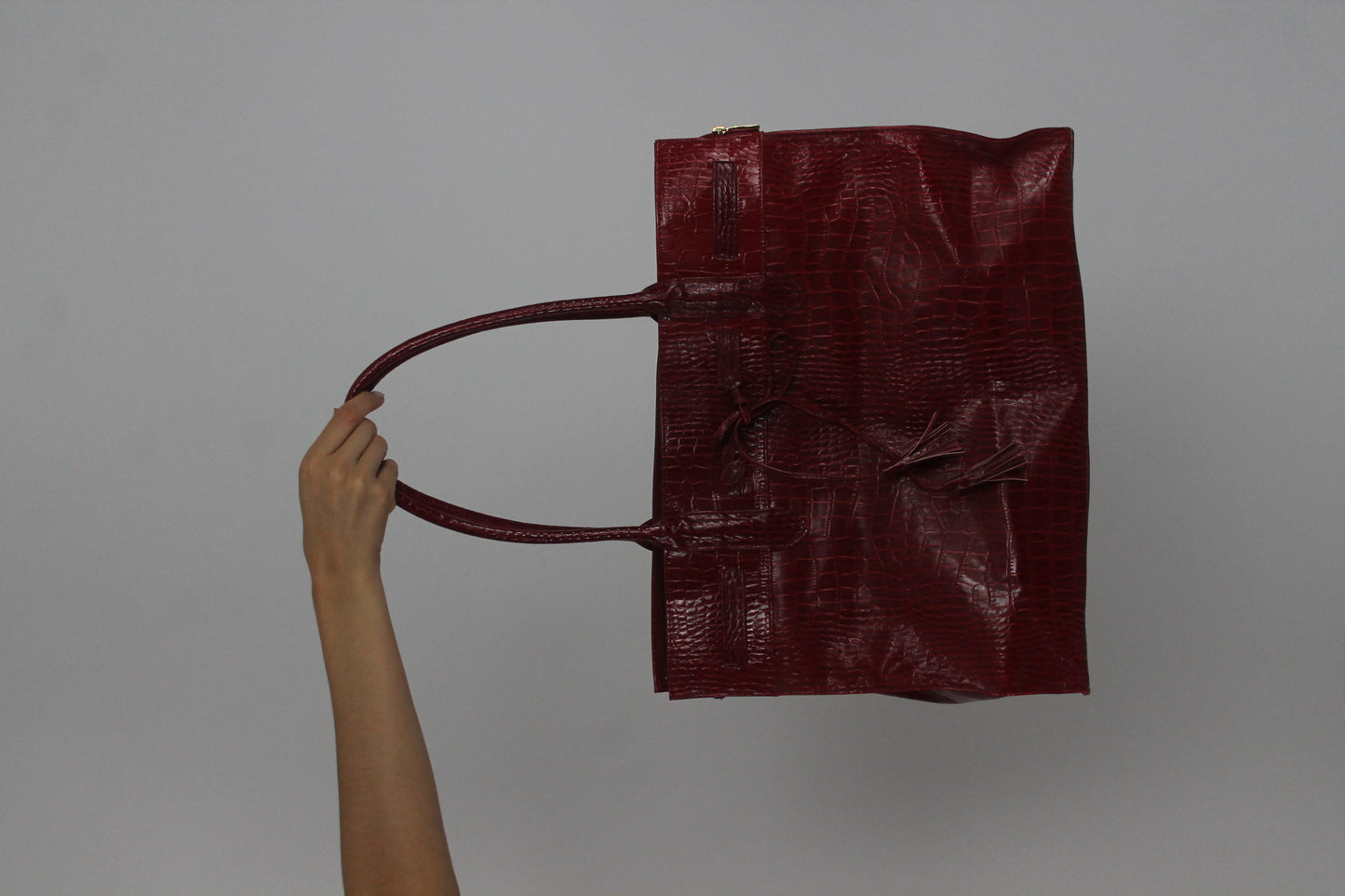 dark red croc-effect tote bag front view