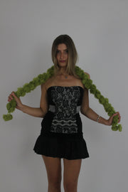 lime green pom-pom scarf front view