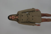 tan belted trench coat front view