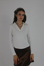 white collared v-neck long-sleeve top front view