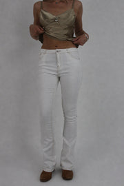 white low-rise flared jeans front view