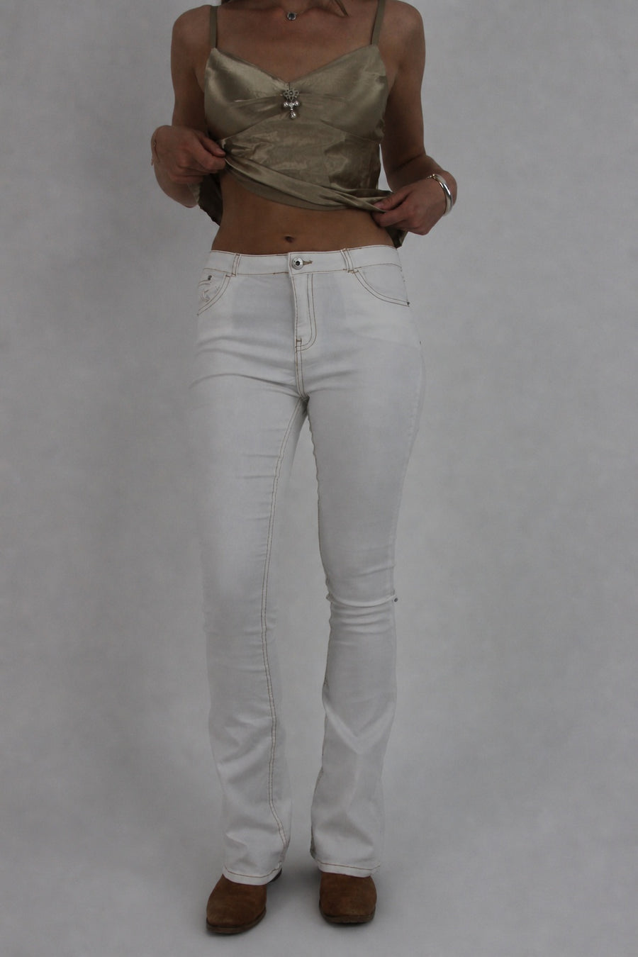 white low-rise flared jeans front view