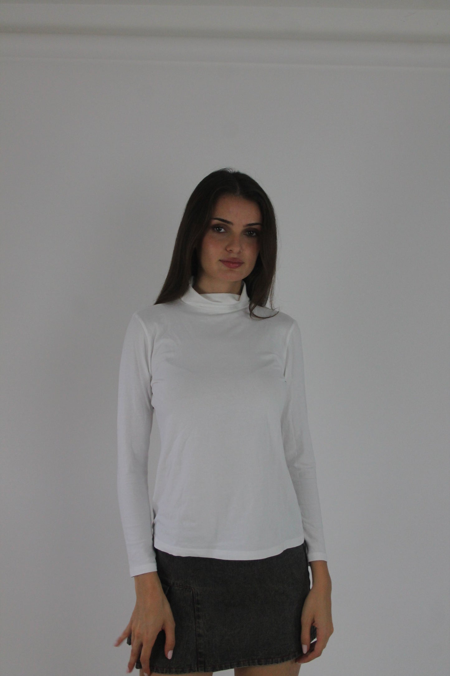 white roll-neck long-sleeve top front view