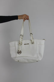 white tote bag with gold-tone hardware front view