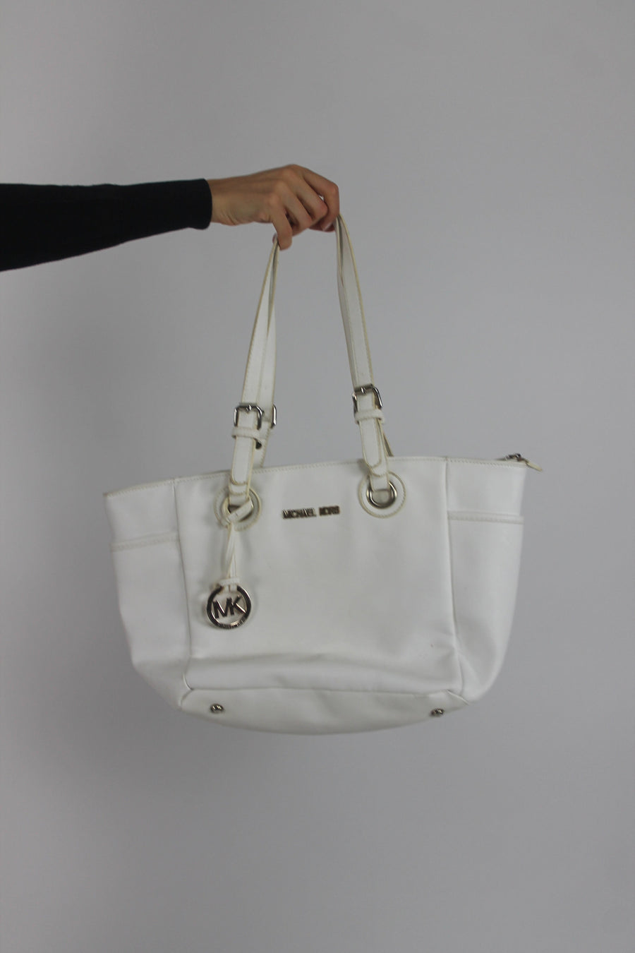 white tote bag with gold-tone hardware front view