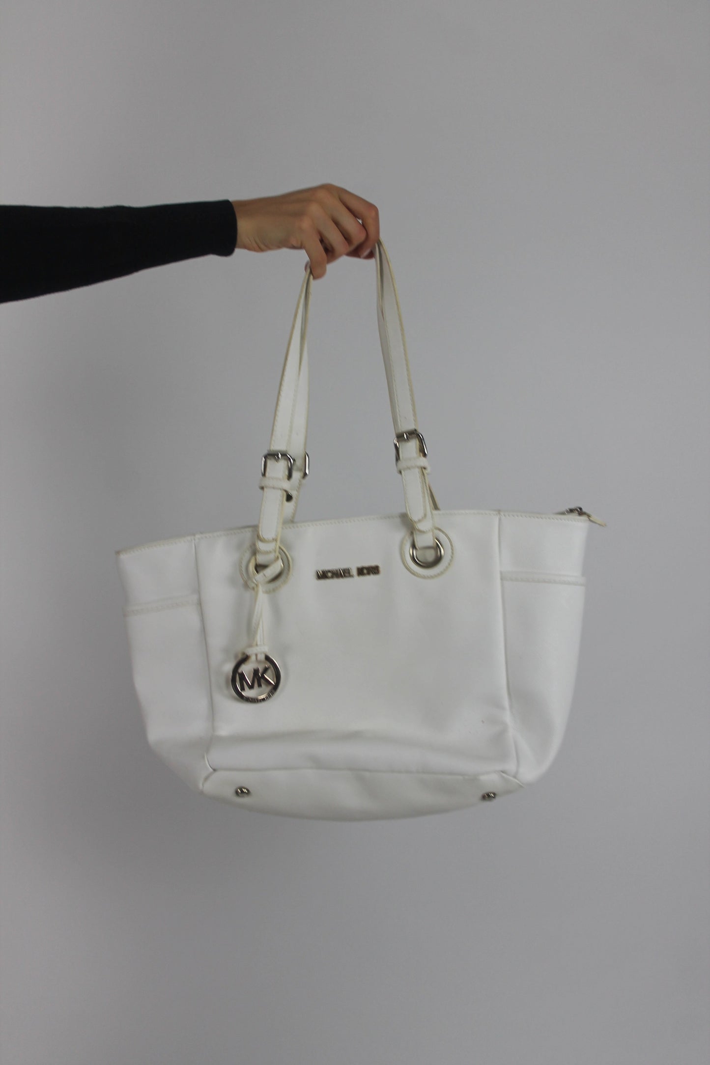 white tote bag with gold-tone hardware front view