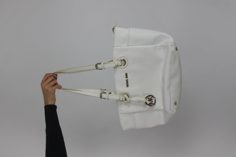 white tote bag with gold-tone hardware front view