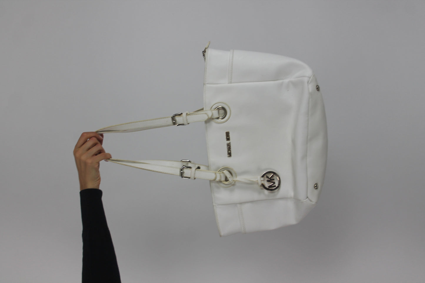 white tote bag with gold-tone hardware front view