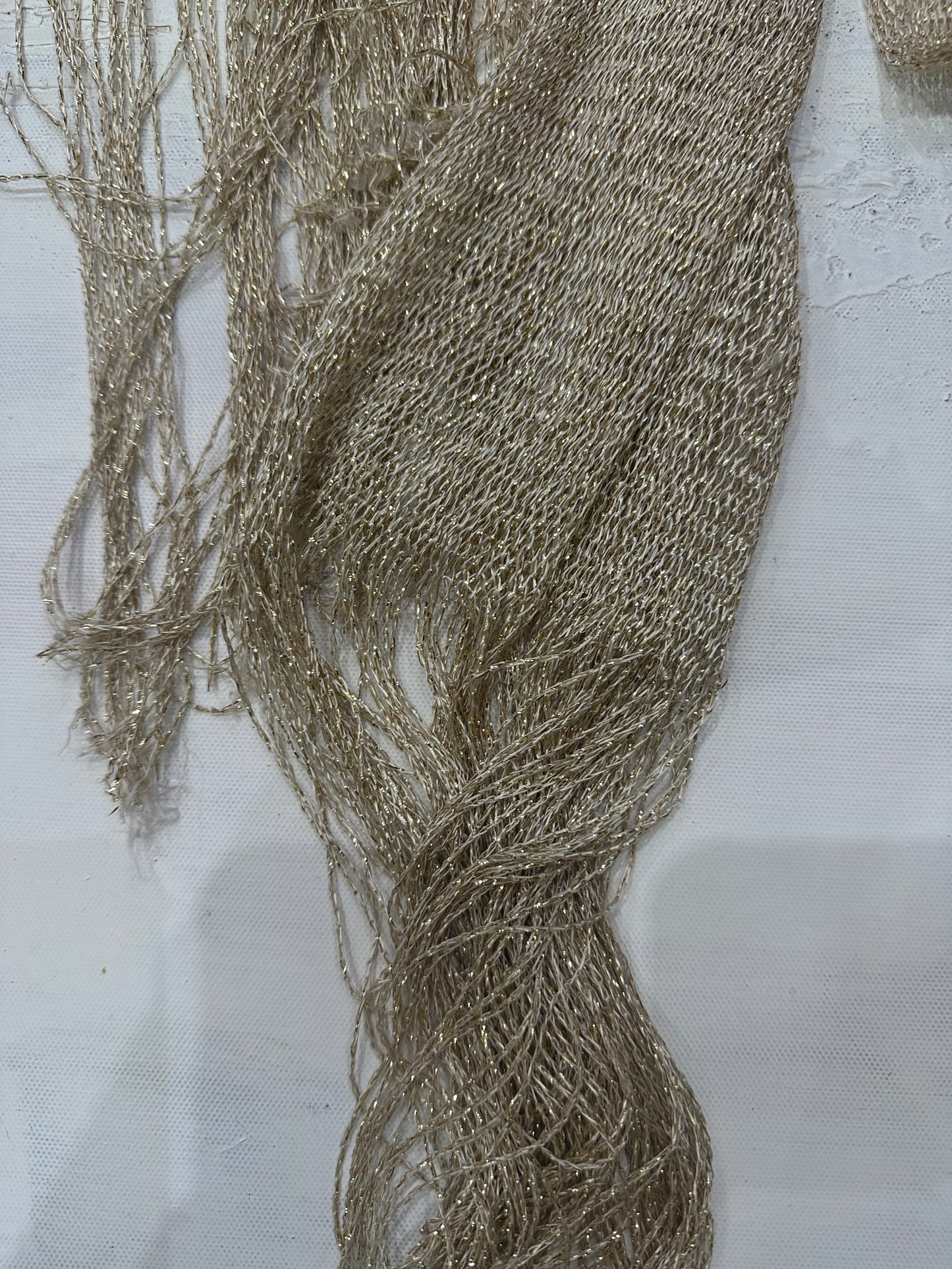 wedding guest drop | gold glittery scarf with tassel details