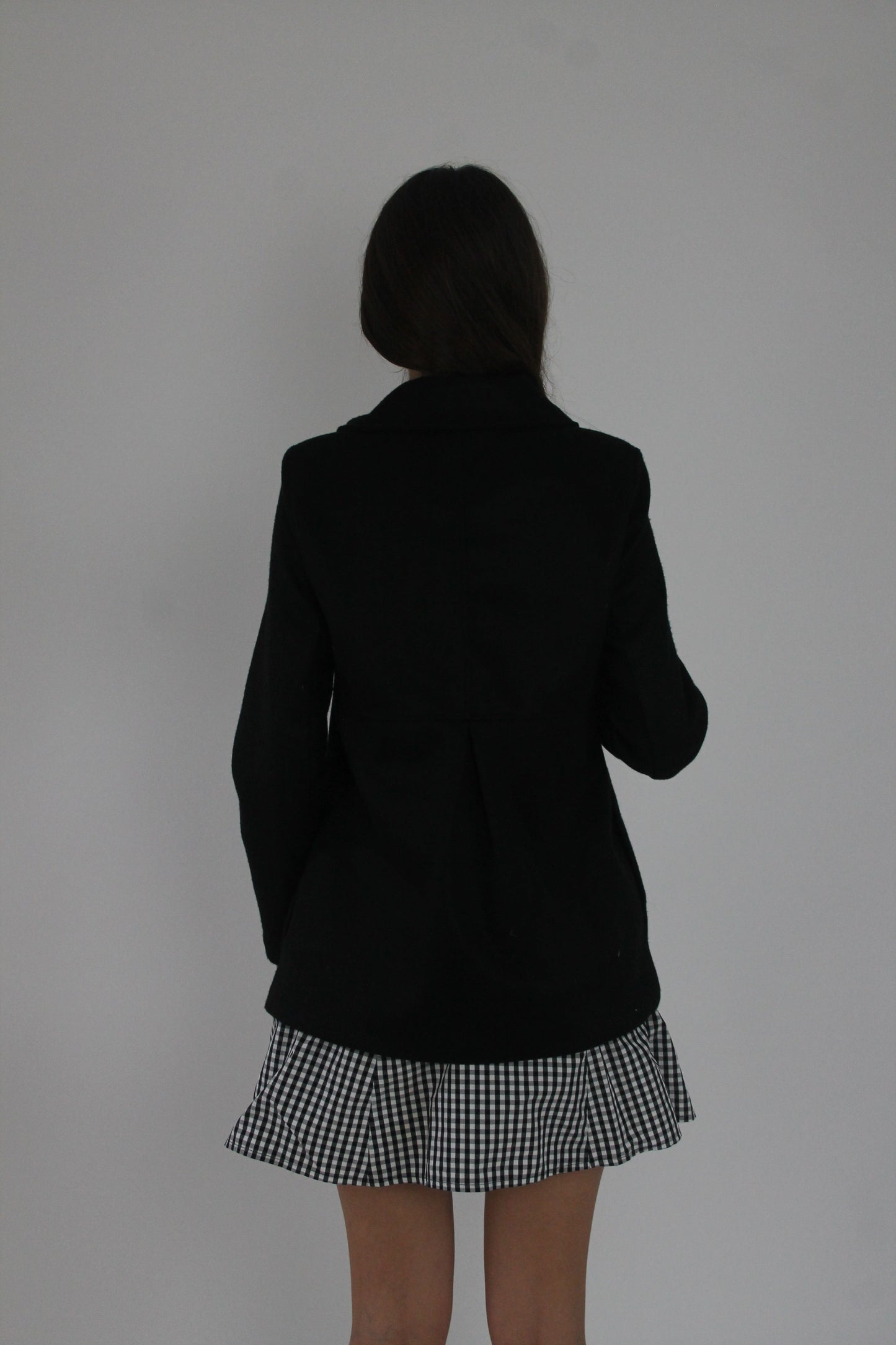 black fitted double-breasted blazer back view