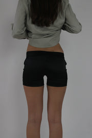 black fitted mini shorts back view