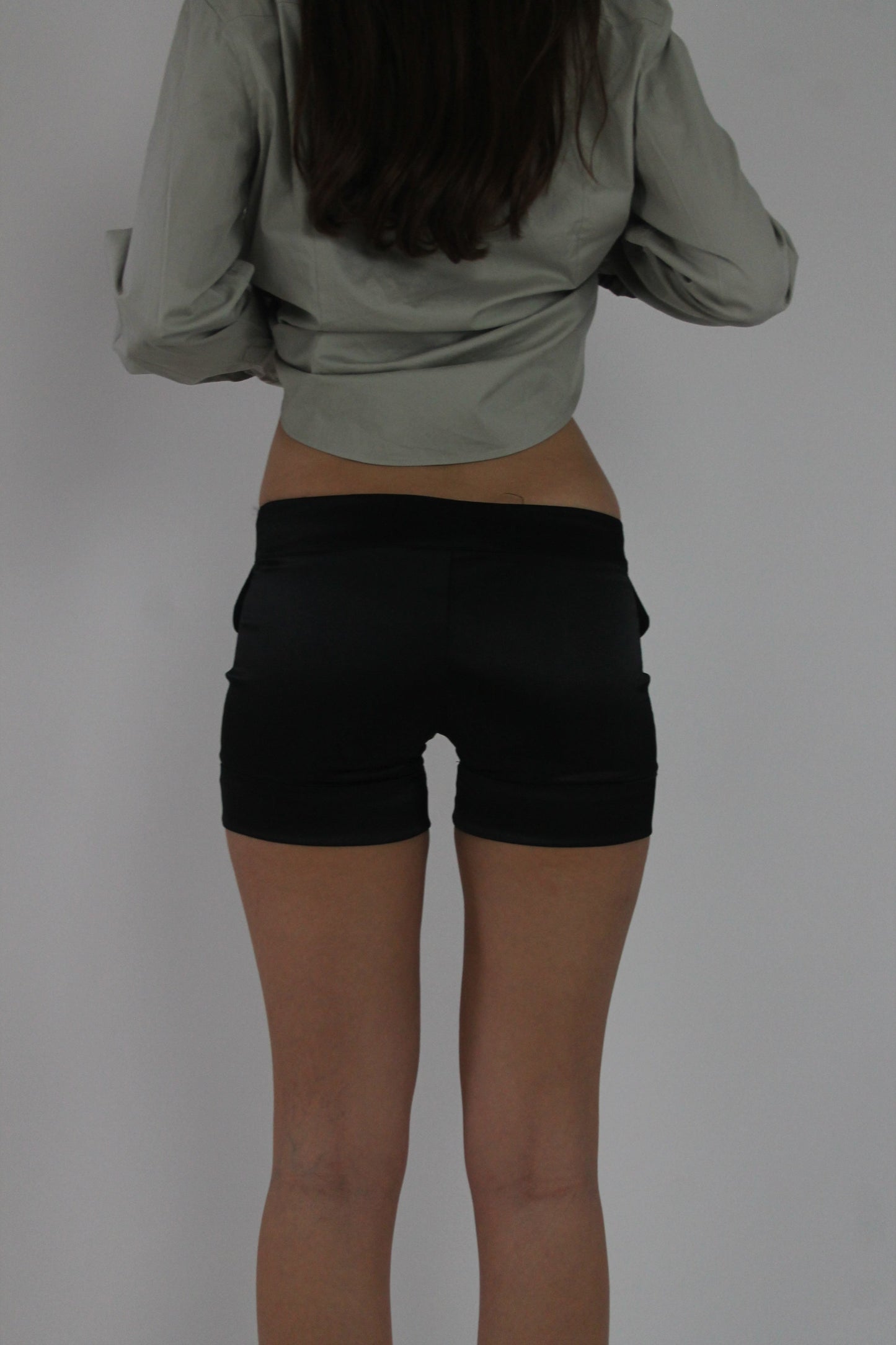 black fitted mini shorts back view