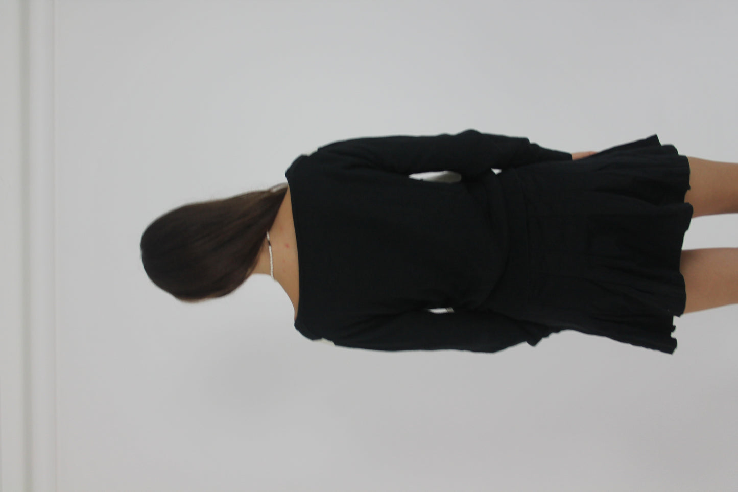 black and white argyle v-neck jumper back view