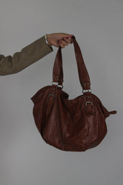 brown leather shoulder bag with buckle details back view