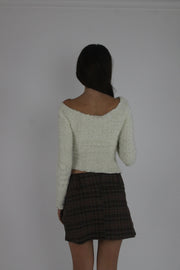 cream lace-up fuzzy top back view