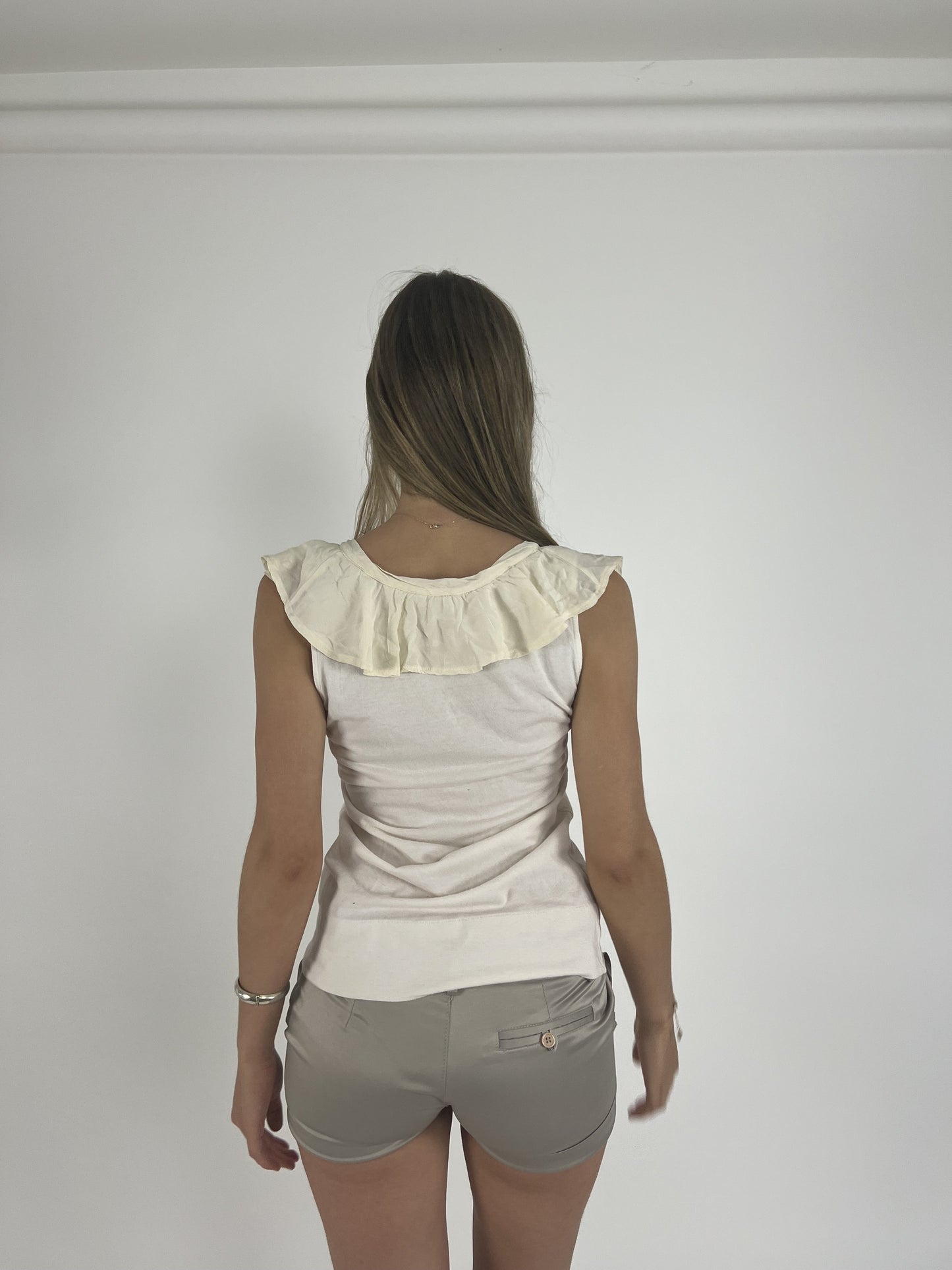 cream ruffle-neckline cap-sleeve top back view