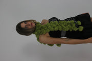 lime green pom-pom scarf back view
