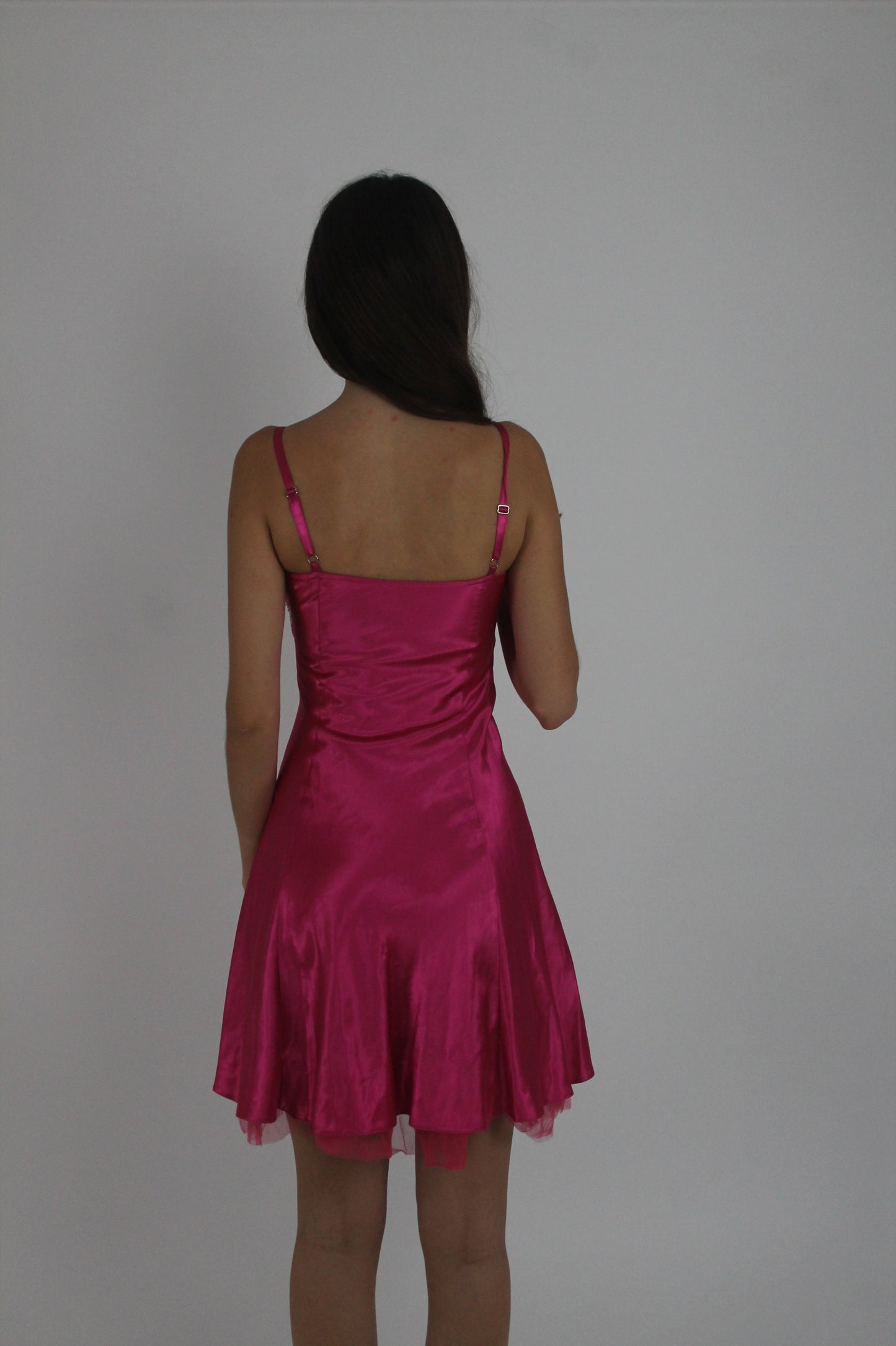pink sequin and ruffle mini dress back view
