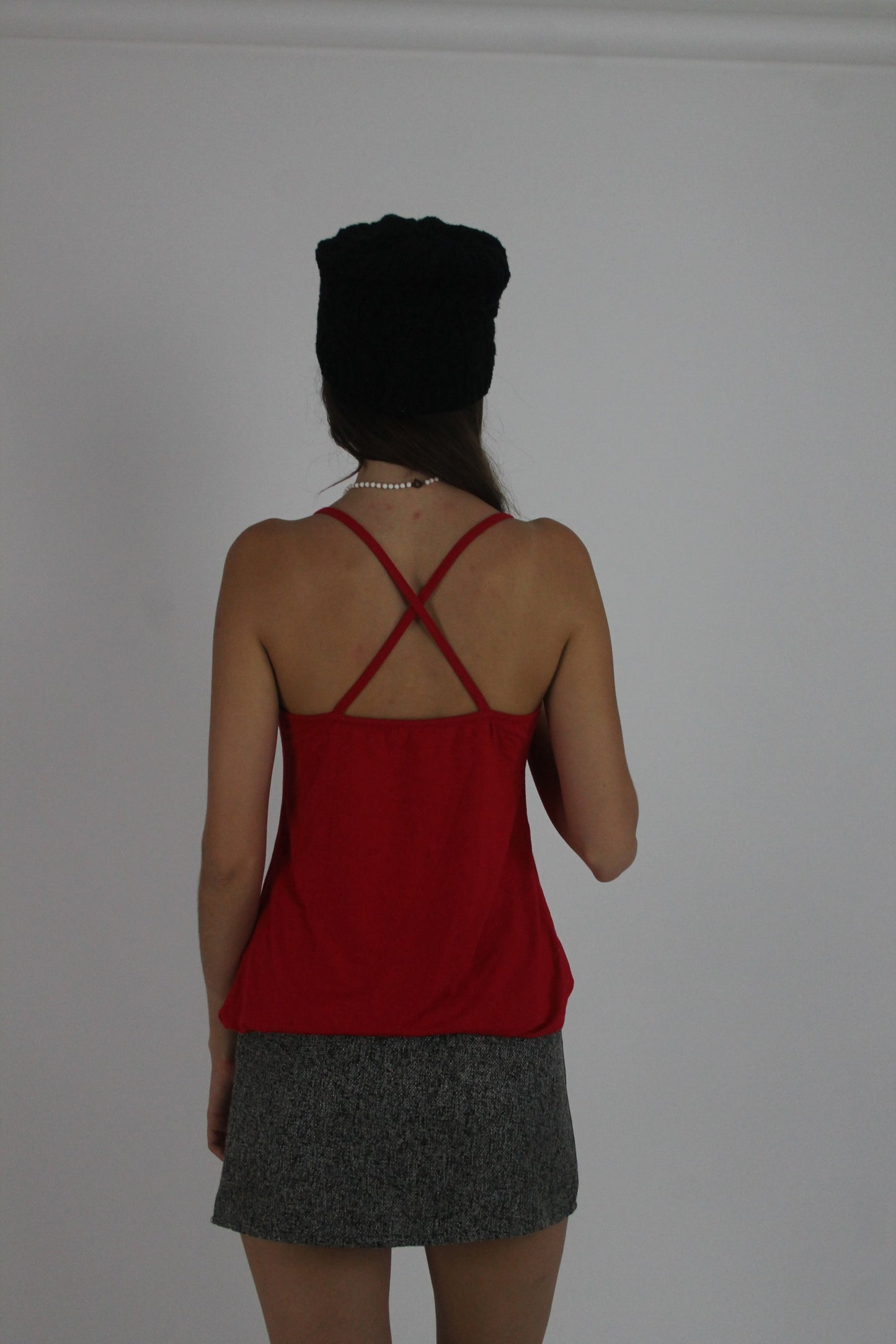 red spaghetti-strap cami top back view