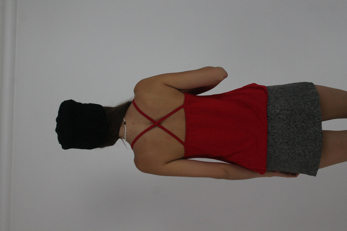 red spaghetti-strap cami top back view