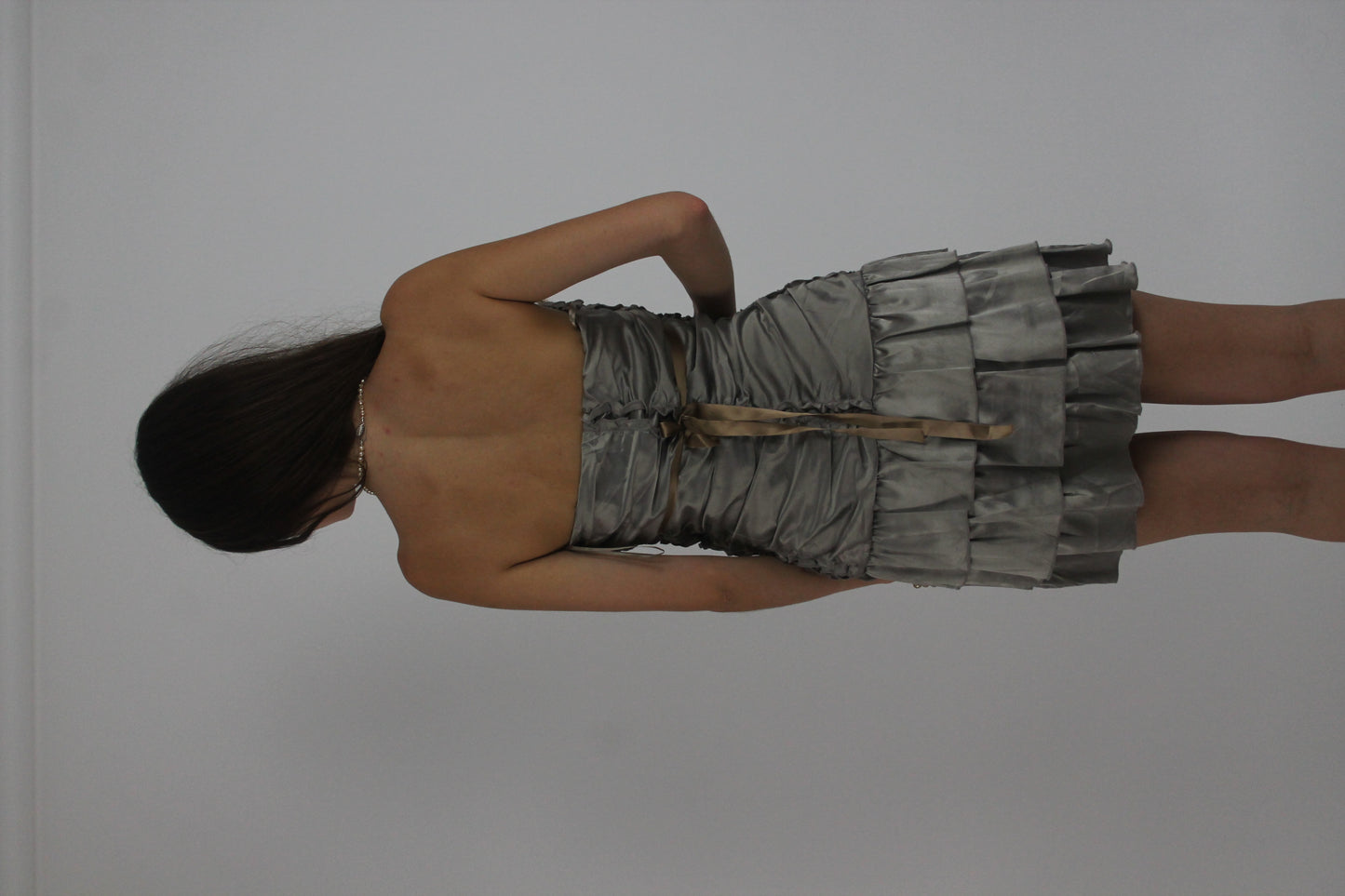 silver tiered satin-style mini dress back view