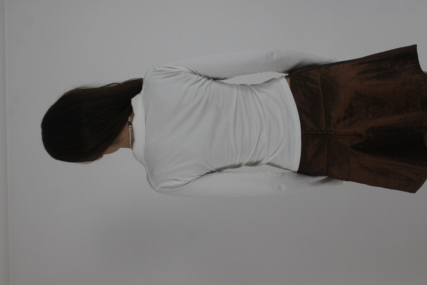 white collared v-neck long-sleeve top back view