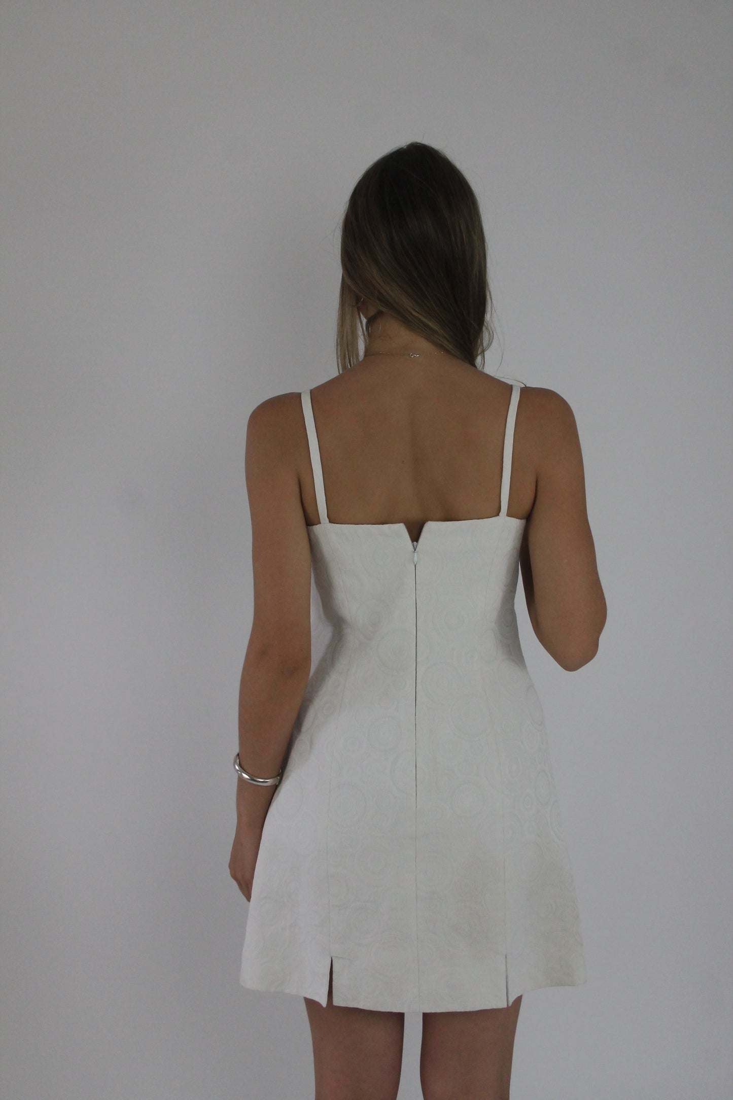 white square-neck mini dress back view