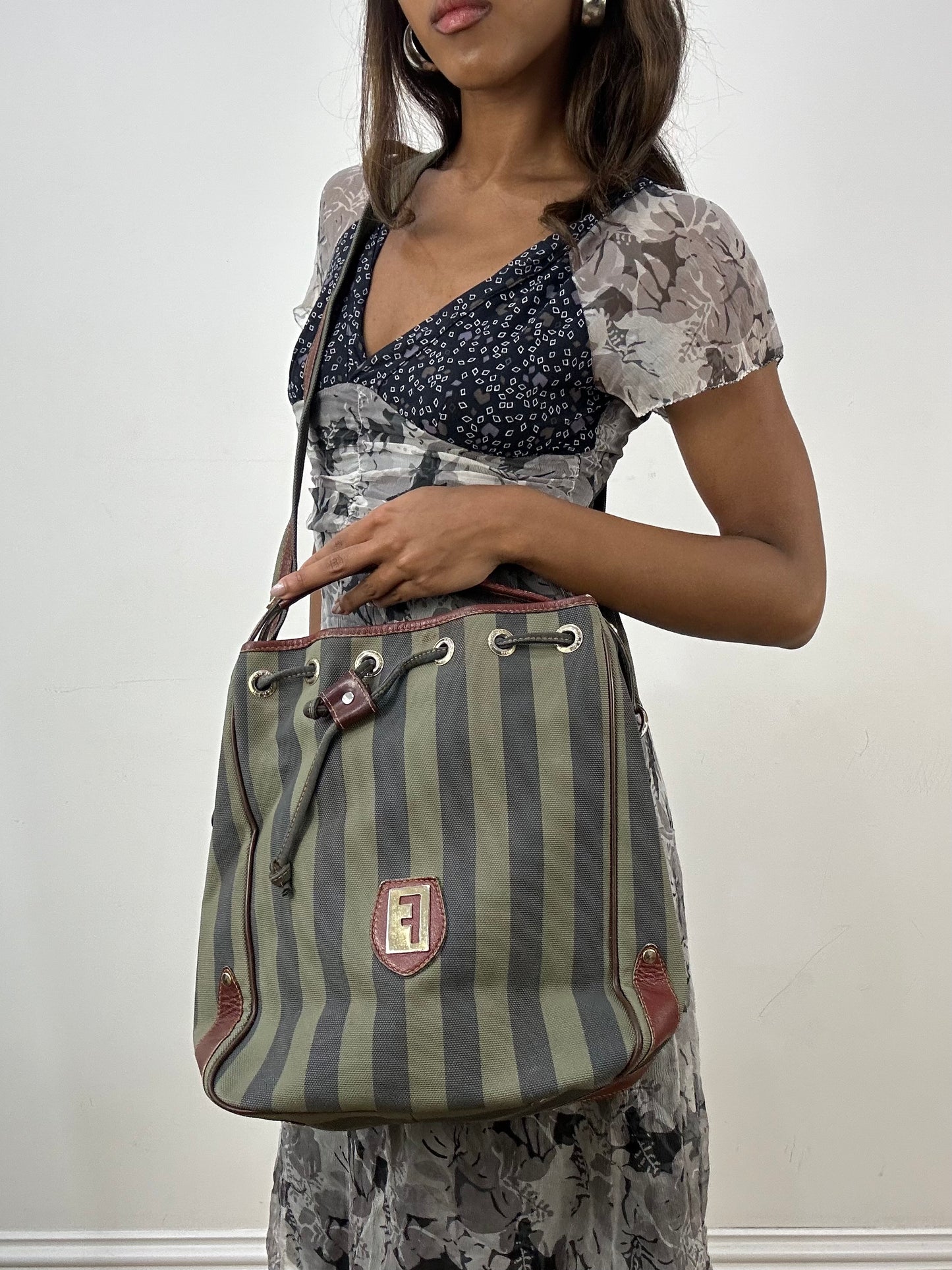 vintage edit: indie sleaze | green and navy striped shoulder bag