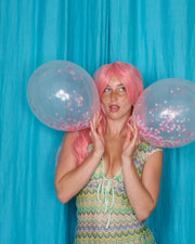Allegra Dress in Pistachio Green – balloon campaign portrait